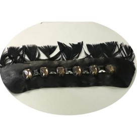 Applique à coudre  en cuir et strass.