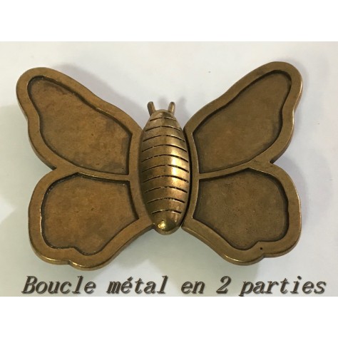 "Boucle en métal Papillon bronze: Une envolée poétique sous forme de papillon"