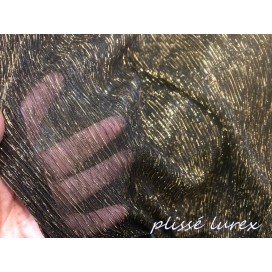 Tissu Plissé Lycra lamé lurex doré sur fond noir Couture