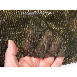 Tissu Plissé Lycra lamé lurex doré sur fond noir Couture