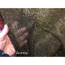 Tissu Plissé Lycra lamé lurex doré sur fond noir Couture